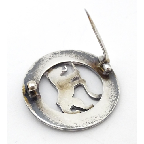 776 - Three assorted items comprising white metal badge titled Berlin Golf Club Founded 1895, a silver bad... 