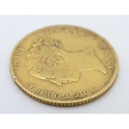 778 - Coin: A Victorian 1869 gold half sovereign coin. Approx. weight 4g. Together with a coin formed fob ... 