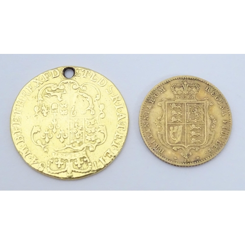 778 - Coin: A Victorian 1869 gold half sovereign coin. Approx. weight 4g. Together with a coin formed fob ... 