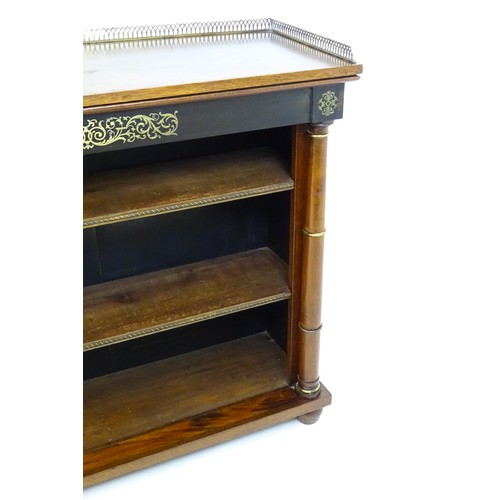 1335 - A 19thc mahogany bookcase surmounted by a brass gallery and with inlaid brass decoration. The bookca... 