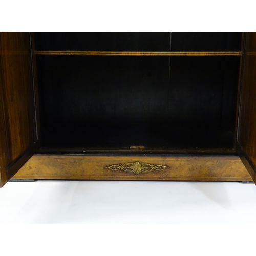 1336 - A 19thC burr walnut credenza, with an ebonised finish to the top edge and to the stepped base. The b... 