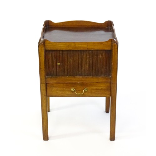 1338 - A late Georgian mahogany tray top table with pierced handles and a tambour front above a single shor... 