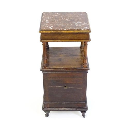 1343 - A late 19thC rosewood cabinet with a rouge marble top above a short frieze drawer and moulded under ... 