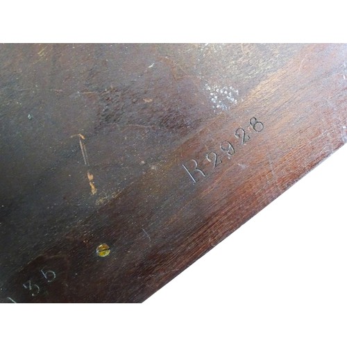 1345 - An Edwardian mahogany hanging wall shelf with decorative satinwood inlay. Bearing label to reverse. ... 