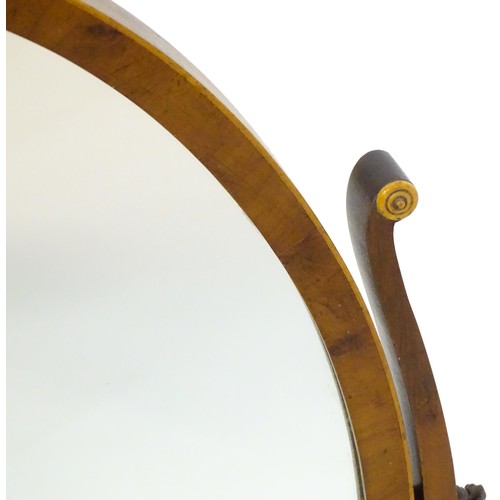 1347 - An early 20thC walnut skeleton mirror with a burr veneered frame and applied roundels. 16