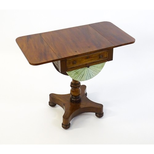 1355 - A 19thC mahogany work table with two drop leaves above a single short drawer with a fitted interior ... 