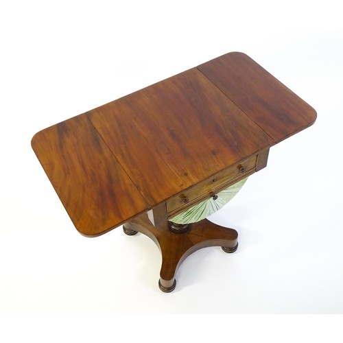 1355 - A 19thC mahogany work table with two drop leaves above a single short drawer with a fitted interior ... 