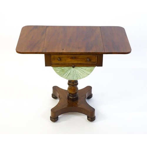 1355 - A 19thC mahogany work table with two drop leaves above a single short drawer with a fitted interior ... 