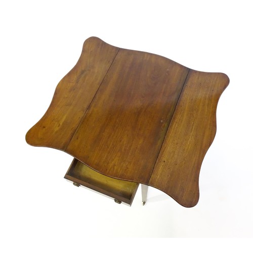 1360 - A 19thC mahogany Pembroke table with two drop leaves, a short frieze drawer with ring pull handles a... 