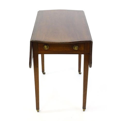 1360 - A 19thC mahogany Pembroke table with two drop leaves, a short frieze drawer with ring pull handles a... 