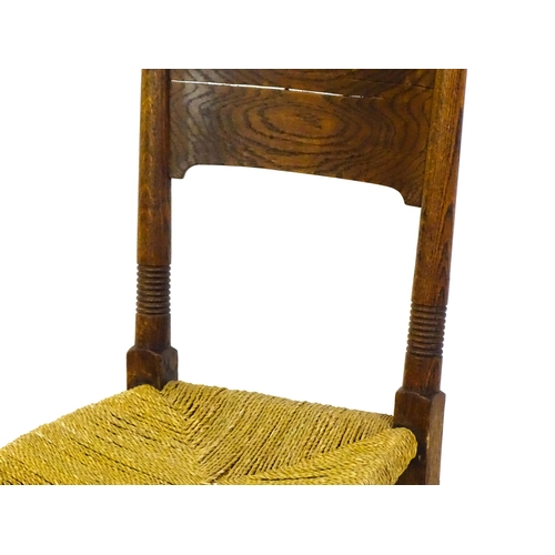 1361 - An Arts & Crafts chair designed by William Birch of High Wycombe, with turned tapering uprights and ... 