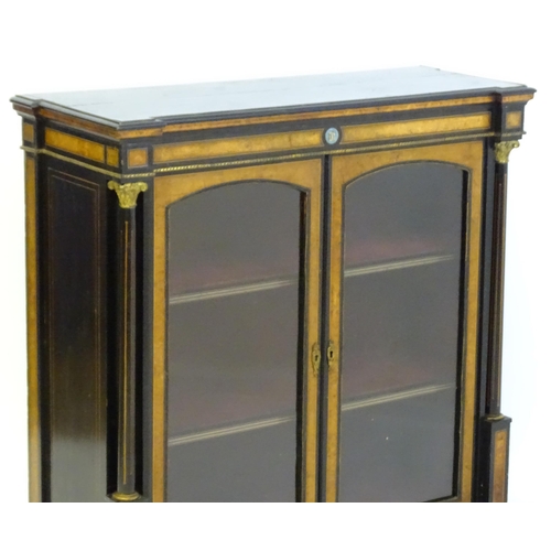 1362 - A 19thC pier cabinet with burr walnut veneers, an ebonised finish and inlaid satinwood stringing. Th... 