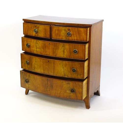 1377 - An early 20thC mahogany chest of drawers, comprising two shorts over three long graduated drawers wi... 