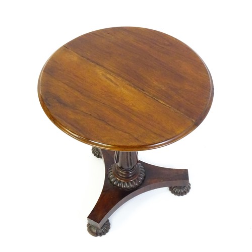 1386 - A mid 19thC rosewood occasional table, with circular thumb moulded top above a tapering pedestal and... 