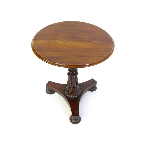 1386 - A mid 19thC rosewood occasional table, with circular thumb moulded top above a tapering pedestal and... 