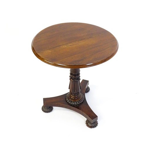 1386 - A mid 19thC rosewood occasional table, with circular thumb moulded top above a tapering pedestal and... 