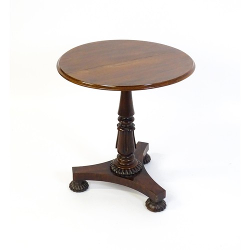 1386 - A mid 19thC rosewood occasional table, with circular thumb moulded top above a tapering pedestal and... 