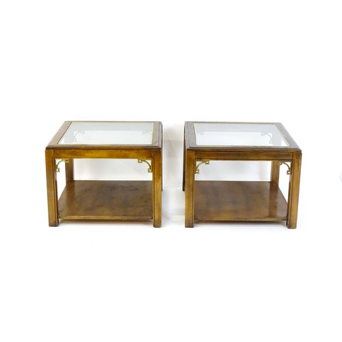 1394 - A pair of late 20thC coffee tables with glass tops, gilt mouldings and Anglo-Japanese style brackets... 