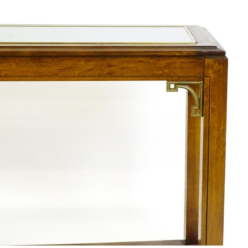 1395 - A late 20thC side table of rectangular form with a glass top, gilt mouldings and brackets to the apr... 