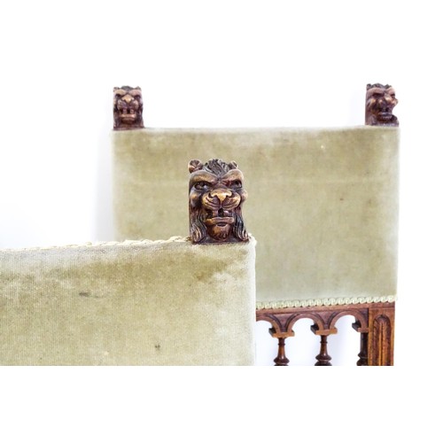 1400 - A set of five late 19thC / early 20thC  walnut dining chairs surmounted by lions heads and turned ta... 