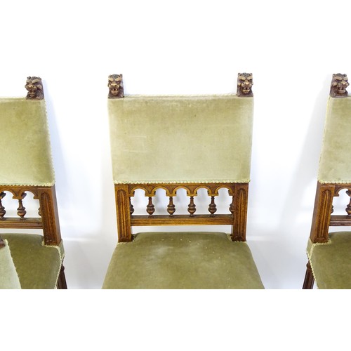 1400 - A set of five late 19thC / early 20thC  walnut dining chairs surmounted by lions heads and turned ta... 