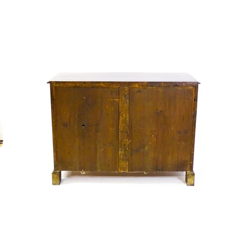 1403 - A late 19thC / early 20thC mahogany sideboard, with a serpentine fronted thumb moulded top above two... 