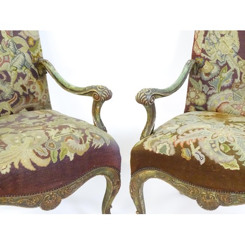 1406 - A pair of 20thC open armchairs, with shaped top rails, shaped arms with carved and scrolled decorati... 