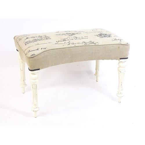 1455 - A 20thC white painted stool with an upholstered top with a concave shaped top raised on fluted turne... 