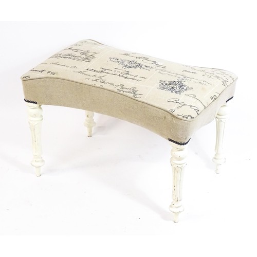 1455 - A 20thC white painted stool with an upholstered top with a concave shaped top raised on fluted turne... 