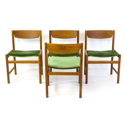 1462 - Vintage / Retro: A set of four 'Dalescraft' teak dining chairs with shaped top rails, upholstered se... 