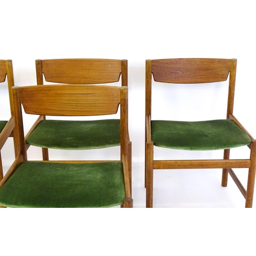 1462 - Vintage / Retro: A set of four 'Dalescraft' teak dining chairs with shaped top rails, upholstered se... 