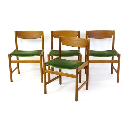 1462 - Vintage / Retro: A set of four 'Dalescraft' teak dining chairs with shaped top rails, upholstered se... 