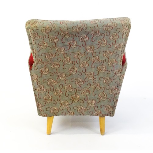 1463 - Vintage / Retro: An upholstered child's chair raised on four turned tapering legs. 22