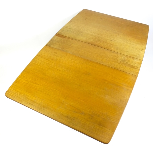 1464 - Vintage / Retro / Mid Century: A teak drop flap table by McIntosh raised on turned tapering legs. 10... 