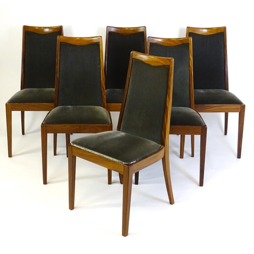 1465 - Vintage / Retro: A set of six teak G plan dining chairs, with a shaped top rail, upholstered backres... 