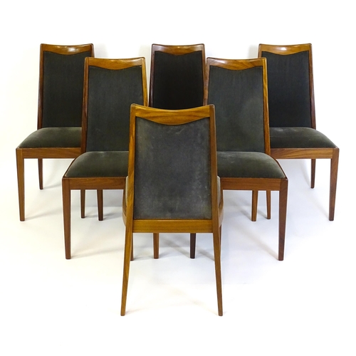 1465 - Vintage / Retro: A set of six teak G plan dining chairs, with a shaped top rail, upholstered backres... 