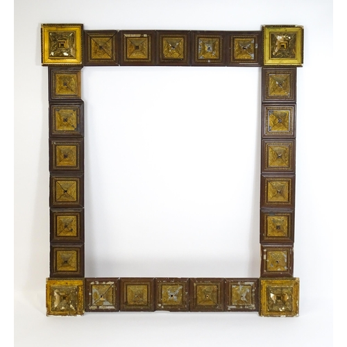 1854 - A large late 19th / early 20thC picture / mirror frame with repeating square decoration with Art Nou... 