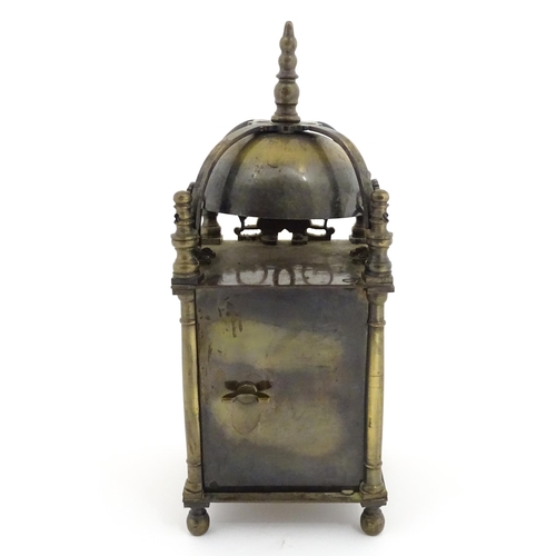 1295 - A 20thC brass cased lantern clock, the movement marked Empire. Approx 10