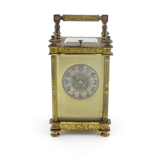 1297 - A late 19thC repeater carriage clock with Arabic numerals and striking on a gong.  Approx 6