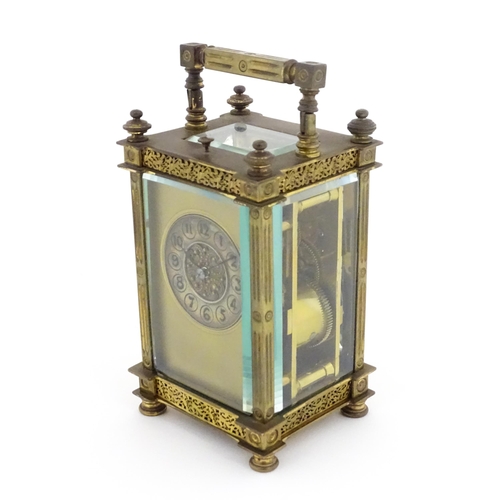 1297 - A late 19thC repeater carriage clock with Arabic numerals and striking on a gong.  Approx 6