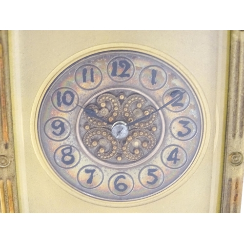 1297 - A late 19thC repeater carriage clock with Arabic numerals and striking on a gong.  Approx 6