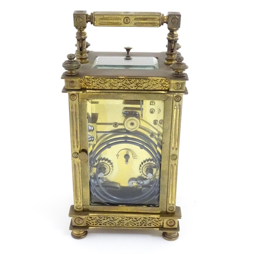 1297 - A late 19thC repeater carriage clock with Arabic numerals and striking on a gong.  Approx 6