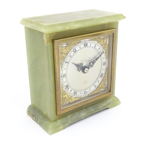 1300 - A mid 20thC mantle clock by Elliott retailed by Hester Clarke Aylesbury. Approx 5 4/4