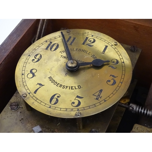 1306 - A mahogany cased clocking in clock by Gledhill - Brook Time Recorders Ltd Huddersfield and numbered ... 