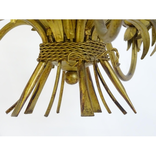 1312 - A mid 20thC gilt toleware pendant light electrolier, formed as a wheatsheaf / bouquet with five bran... 