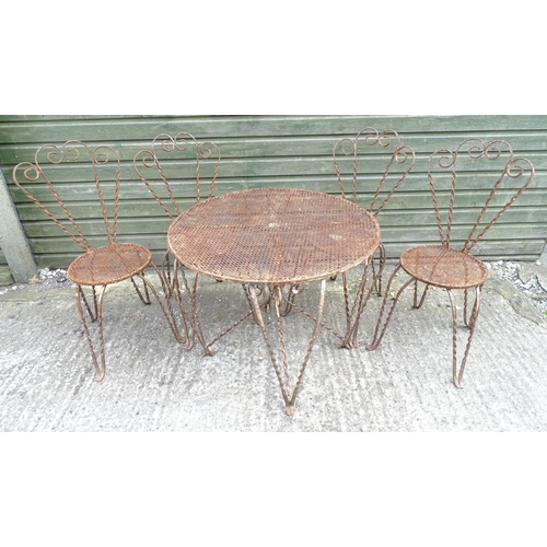 1322 - Mid 20thC wrought iron bistro / garden / patio furniture, comprising four chairs and circular table ... 