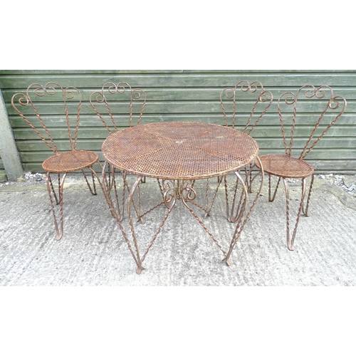 1322 - Mid 20thC wrought iron bistro / garden / patio furniture, comprising four chairs and circular table ... 