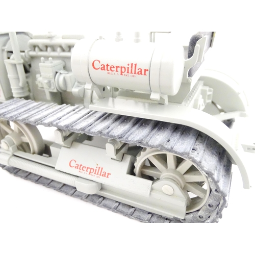 852 - Toys: Two Caterpillar CAT die cast scale model vehicles comprising a 1931 Model Sixty Diesel, boxed ... 