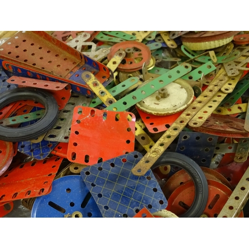 856 - Toys: A large quantity of assorted Meccano to include flat plates, girders, wheels, various instruct... 