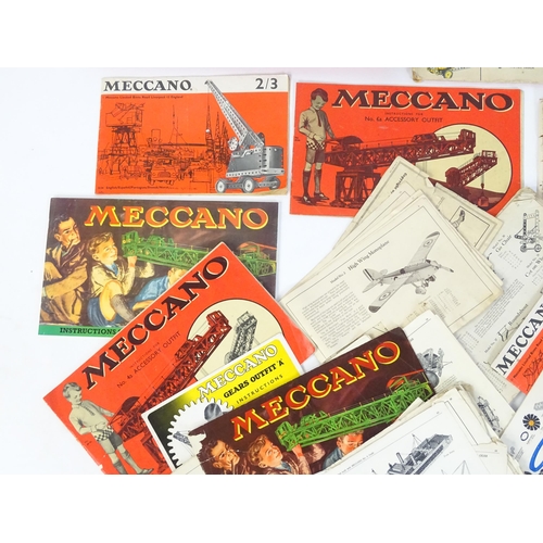 856 - Toys: A large quantity of assorted Meccano to include flat plates, girders, wheels, various instruct... 